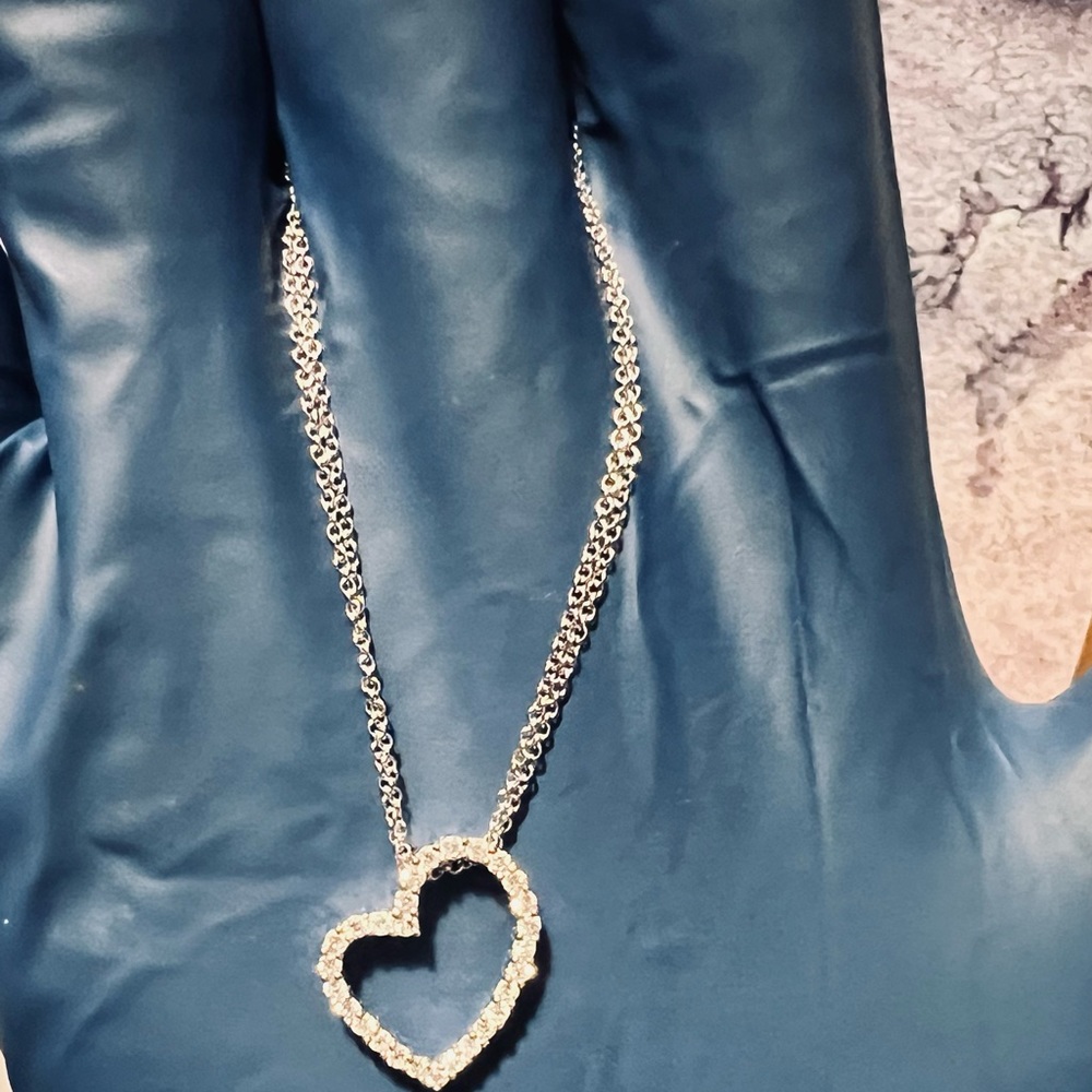 18k white gold chain with a open heart diamond pendant